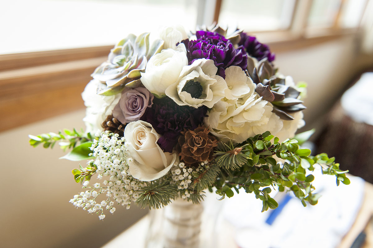 Flowers arranged byt the window