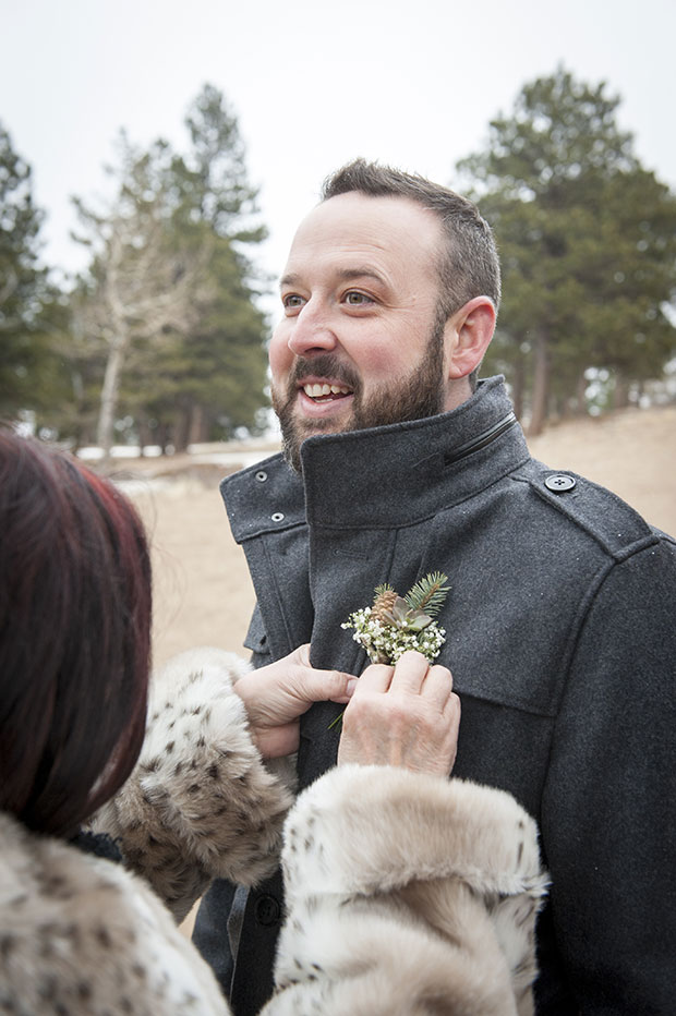 Nick's mom pinning on his flower