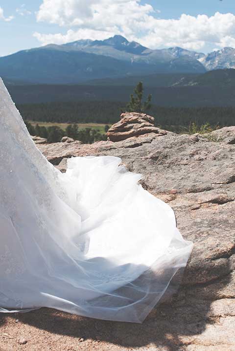 the Bride's dress with the mountains in the background