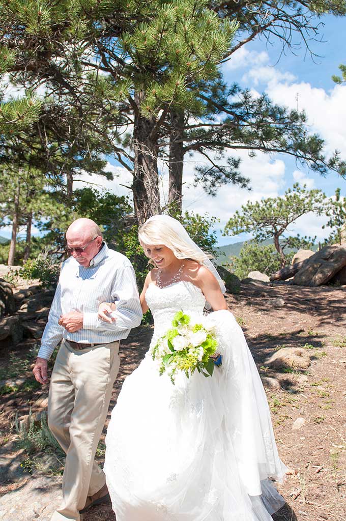 Katie and her father walking in the trees